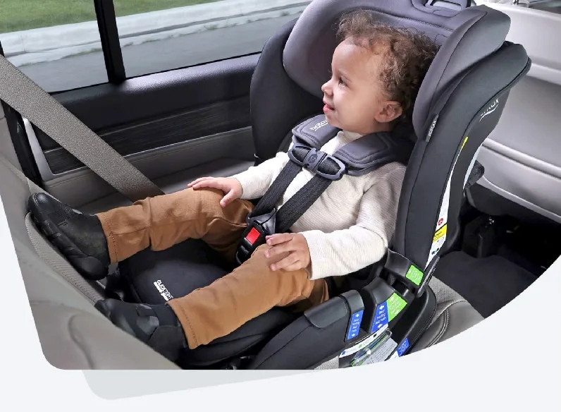 when should you turn the car seat around